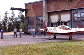 Redigo in front of the hangar