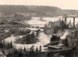   Patalankoski in 1919. On the right the paper mill and grinding mill. The water intake sluice leads into the turbine room.