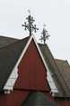 Seppo J. J. Sirkka,  (c) Eastpress Oy,  Kuoreveden kirkon kirkonkukko tuuliviirinä. Symbolissa on nähtävissä myös risti.