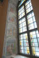   Artwork painted by the artist Urho Lehtinen in the window recess and glass window of the baptism chapel of Jämsä church.